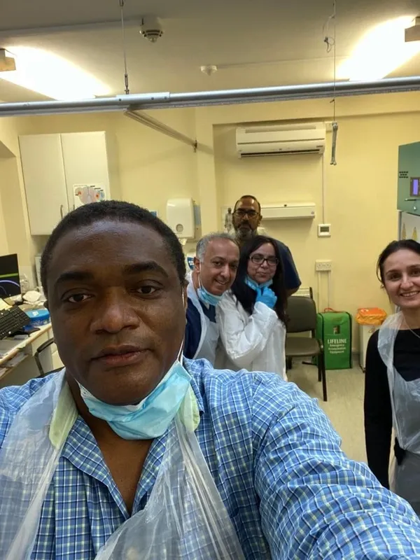 One of the clinicians taking a selfie of the clinicians in the vaccination clinic